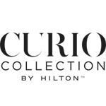 The image shows the logo of Curio Collection by Hilton, featuring the brand name in a sophisticated and elegant font style.