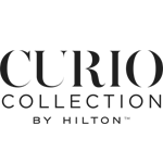 The image shows the logo of Curio Collection by Hilton, featuring the brand name in a sophisticated and elegant font style. logo on footer section.