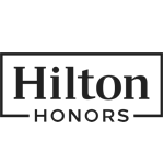 The image displays the logo for Hilton Honors, featuring the words "Hilton Honors" enclosed in a rectangular border.